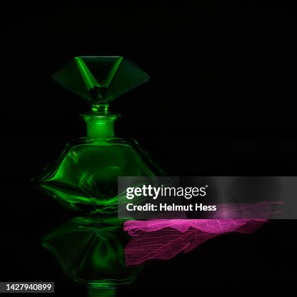 Glass flacon and leaf Glass flacon and leaf