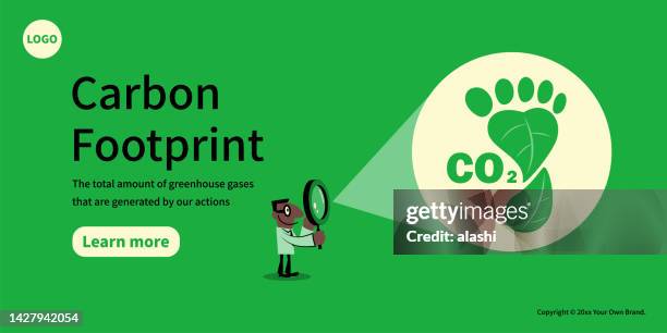 stockillustraties, clipart, cartoons en iconen met a man looks at the carbon footprint symbol through a magnifying glass, the concept of sustainability, and environmental protection - low carbon technology