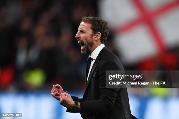 Gareth Southgate, Manager of England celebrates their side's third goal during the UEFA Nations League League A Group 3 match between England and...