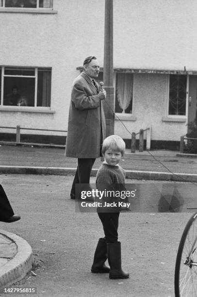 British politician Enoch Powell holding a microphone as he campaigns for the Ulster Unionist Party for the South Down constituency, County Down,...