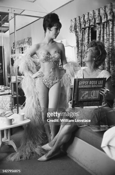 American actress Natalie Wood and American burlesque dancer Louise Hovick during a break in filming of the musical 'Gypsy,' at Warner Bros' Burbank...