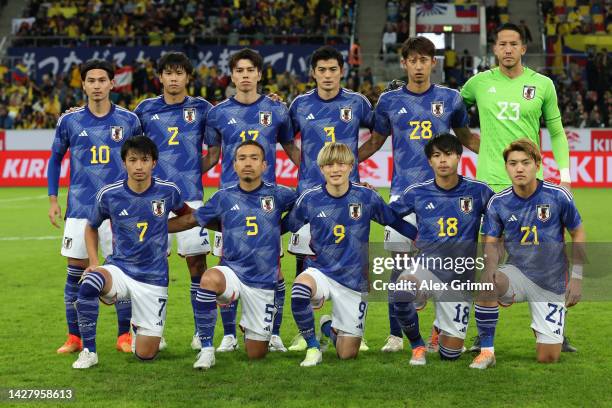 Players of Japan pose for a team photo prior to the international friendly match between Japan and Ecuador at Merkur Spiel-Arena on September 27,...