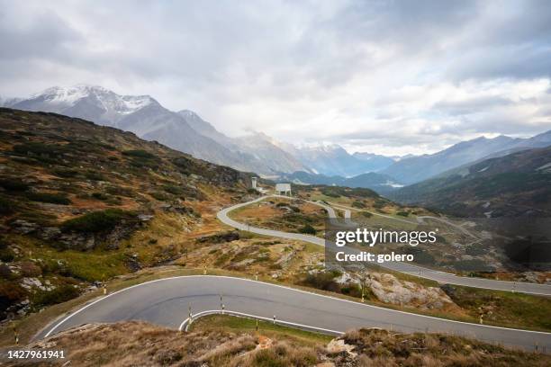 panoramic view on san bernardino pass with swiss alps moutain range - mountain pass stock pictures, royalty-free photos & images