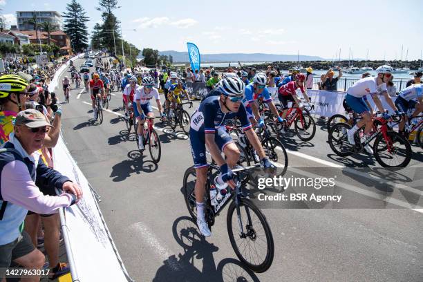 The peloton enters the city centre along the foreshore during the Men Road Race during the 95th UCI Road World Championships 2022 on September 25,...