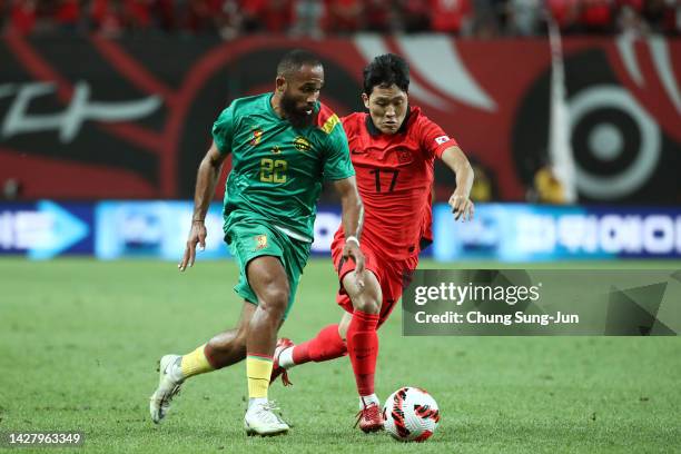 Mbemo Bryan of Cameroon competes for the ball with Na Sang-Ho of South Korea during the South Korea v Cameroon - International friendly match at...