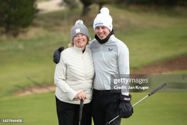 Matt Fitzpatrick of England poses for a photo with their mother, Susan Fitzpatrick during a practice round prior to the Alfred Dunhill Links...