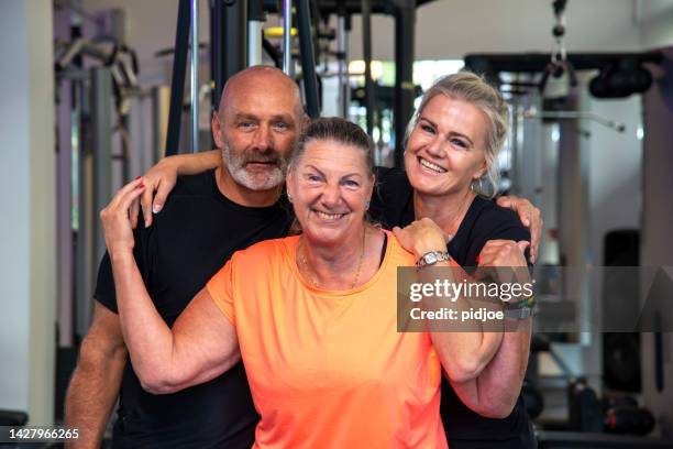 middle-aged friends in the gym. - heavy set women stock pictures, royalty-free photos & images