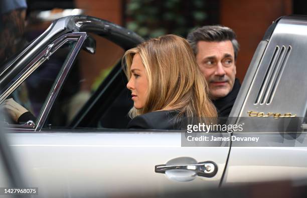 Jennifer Aniston and Jon Hamm are seen filming on location for 'The Morning Show' at the Mercer Hotel on September 26, 2022 in New York City.