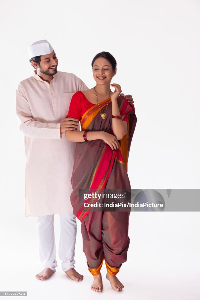 Portrait of young Maharashtrian couple standing together