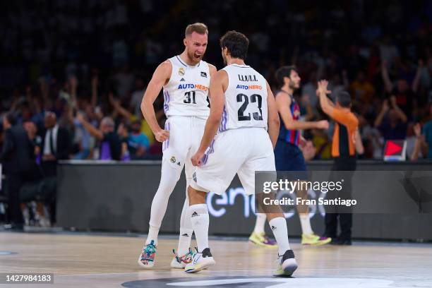 Sergio Llull and Dzanan Musa of Real Madrid celebrate during the Supercopa Endesa final match between Real Madrid and FC Barcelona on September 25,...