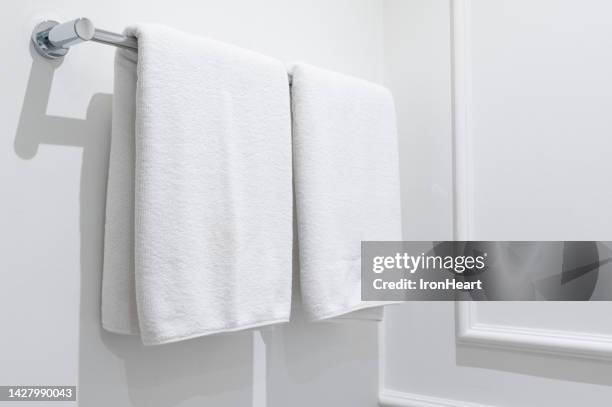 towel in the bathroom - bathroom wall stock pictures, royalty-free photos & images