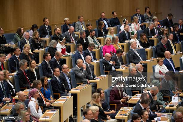 Politicians are seen attending at the opening of the Swedish Parliament for the fall session at the Riksdag Parliament building on September 27, 2022...