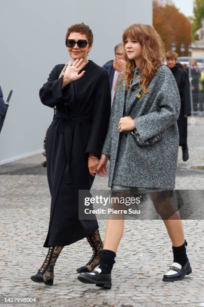 Maggie Gyllenhaal and daughter Ramona Sarsgaard attends the Christian Dior Womenswear Spring/Summer 2023 show as part of Paris Fashion Week on...
