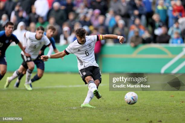 Umut Tohumcu of Germany U19 scores is teams first goal by penalty during the UEFA Under-19 European Championship Qualifier between Germany U19 and...