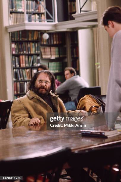 View of American actor Joe Pesci in the at the Boston Athenaeum during the filming of 'With Honors' , Cambridge, Massachusetts, March 1993.