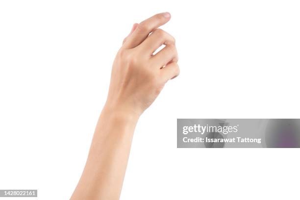 female hand holding a virtual card with your fingers on a white background - woman white background foto e immagini stock