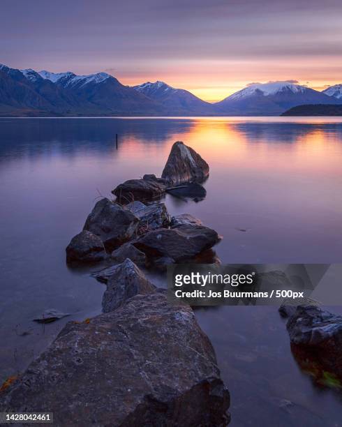 scenic view of lake against sky during sunset,closeburn,new zealand - lake wakatipu stock pictures, royalty-free photos & images