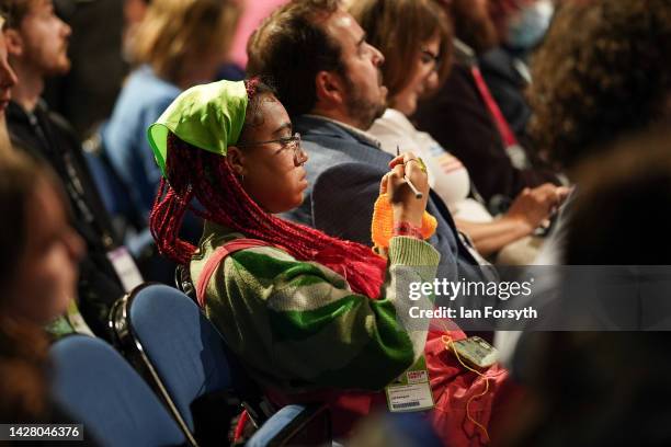 Woman does her knitting as she sits in the main conference hall at the Labour Party conference on September 27, 2022 in Liverpool, England The Labour...