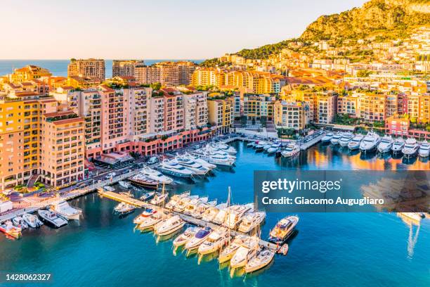 high angle view of principality of monaco at sunrise, french riviera, france - koninklijk paleis monaco stockfoto's en -beelden