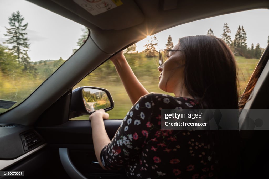Woman riding in a car