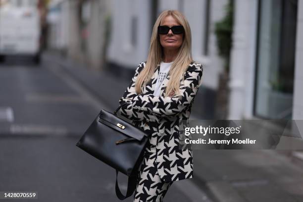 Martina Maturi is seen wearing black Burberry sunglasses, white/black  News Photo - Getty Images