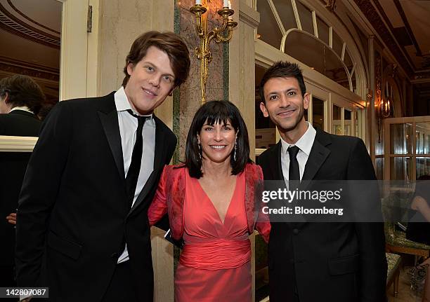 Fashion designer Wes Gordon, from left, honorary chair Judy Dimon, and Paul Arnhold stand for a photograph at the Ballet Hispanico gala in New York,...