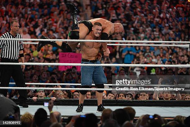 Dwayne ''The Rock'' Johnson and John Cena in action during WrestleMania XXVIII at Sun Life Stadium on April 1, 2012 in Miami Gardens, Florida.