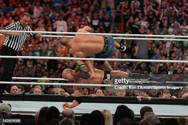 Dwayne ''The Rock'' Johnson and John Cena in action during WrestleMania XXVIII at Sun Life Stadium on April 1, 2012 in Miami Gardens, Florida.