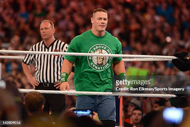 John Cena looks on before his match against Dwayne ''The Rock'' Johnson during WrestleMania XXVIII at Sun Life Stadium on April 1, 2012 in Miami...