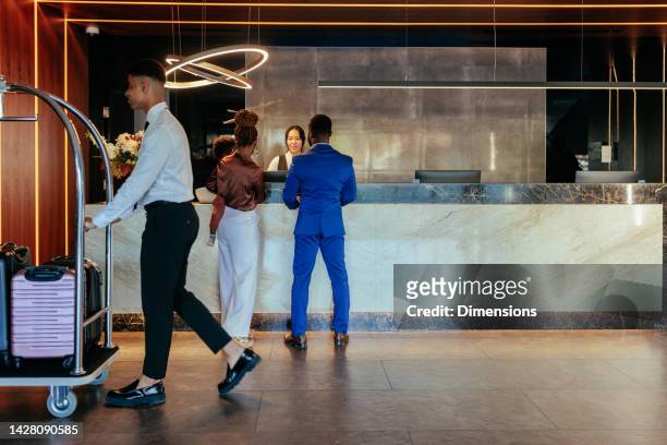 busy hotel lobby. - bus boy stock pictures, royalty-free photos & images