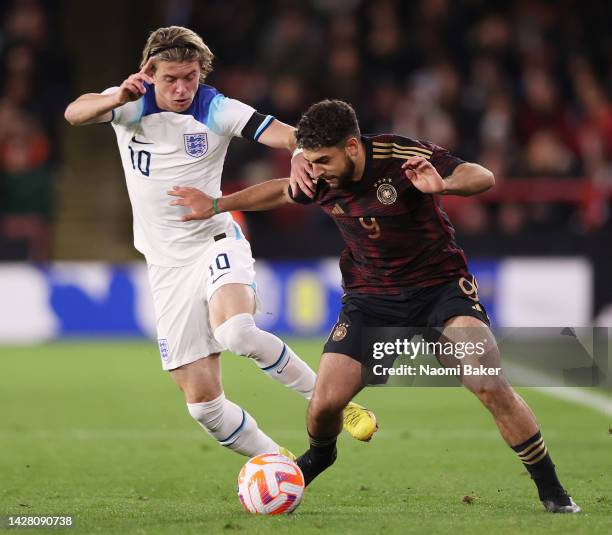 Reda Khadra of Germany is challenged by Conor Gallagher of England during the International Friendly match between England U21 and Germany U21 at...