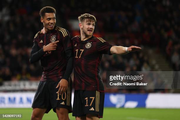Felix Nmecha of Germany celebrates with team mate Jan Thielmann after scoring their sides first goal during the International Friendly match between...