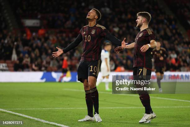 Felix Nmecha of Germany celebrates with team mate Jan Thielmann after scoring their sides first goal during the International Friendly match between...