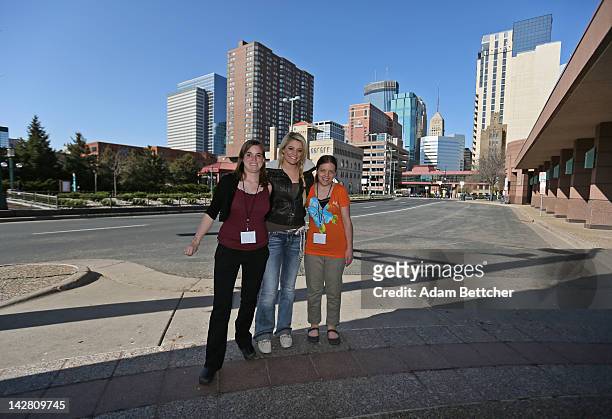 Two associates from the Special Olympics pose with American Idol season ten runner- up Lauren Alaina after Alaina was announced as the new Special...