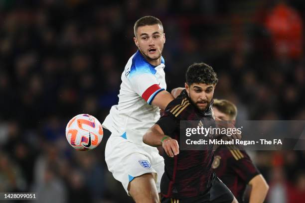 Reda Khadra of Germany competes for a header with Taylor Harwood-Bellis of England during the International Friendly match between England U21 and...
