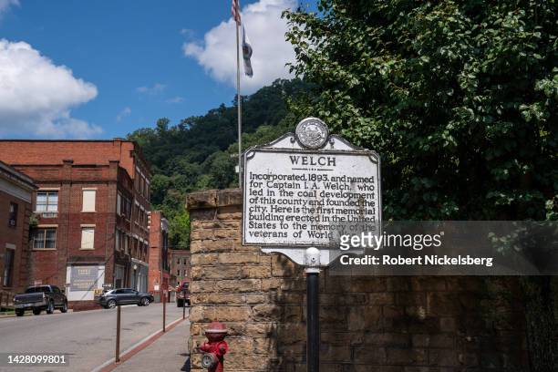 Historic marker stands in a park August 27, 2022 next to the Court House building in Welch, West Virginia. With the collapse of the West Virginia...