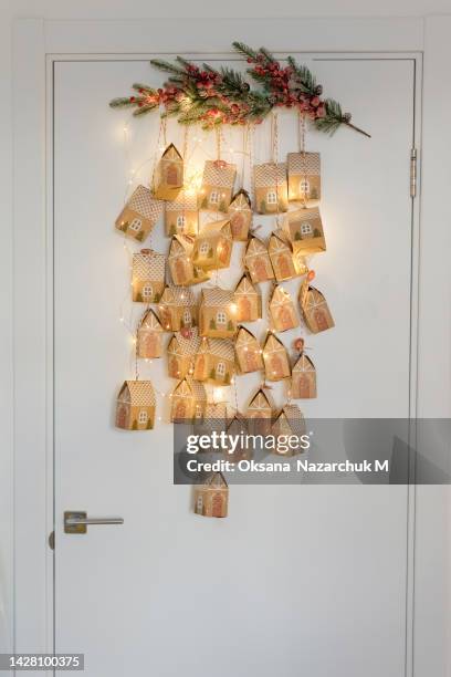 hanging advent calendar house box - advent stock-fotos und bilder