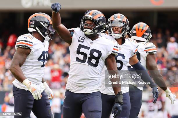 Roquan Smith of the Chicago Bears celebrates a tackle against the Houston Texans at Soldier Field on September 25, 2022 in Chicago, Illinois.