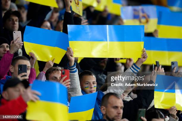 Ukraine fans hold up banners to show their support during the UEFA Nations League League B Group 1 match between Ukraine and Scotland at Stadion im...