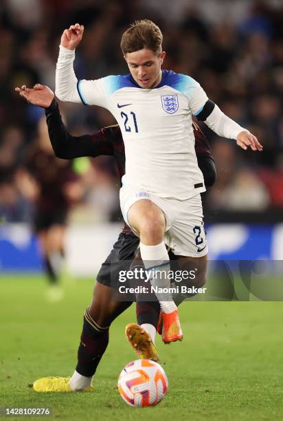 James McAtee of England is challenged by Faride Alidou of Germany during the International Friendly match between England U21 and Germany U21 at...