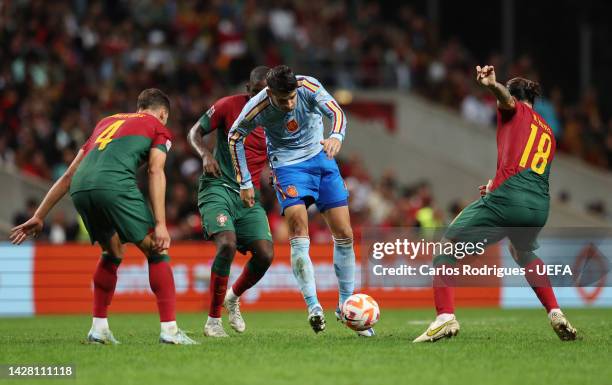 Alvaro Morata of Spain is challenged by Ruben Neves of Portugal during the UEFA Nations League League A Group 2 match between Portugal and Spain at...