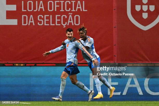 Alvaro Morata of Spain celebrates scoring their side's first goal with teammate Nico Williams during the UEFA Nations League League A Group 2 match...