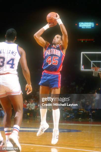 Adrian Dantley of the Detroit Pistons takes a jump shot during basketball game against the Washington Bullets at Capital Centre on April 12, 1987 in...