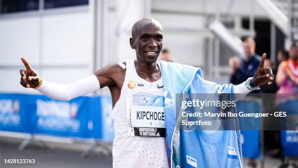 Eliud Kipchoge of Kenia celebrates his marathon world record at 2:01:09 during the 2022 BMW Berlin-Marathon on September 25, 2022 in Berlin, Germany.