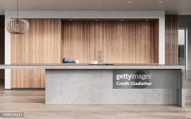 modern white kitchen with rectangular gray concrete breakfast kitchen island and counter top - wood paneling stock pictures, royalty-free photos & images