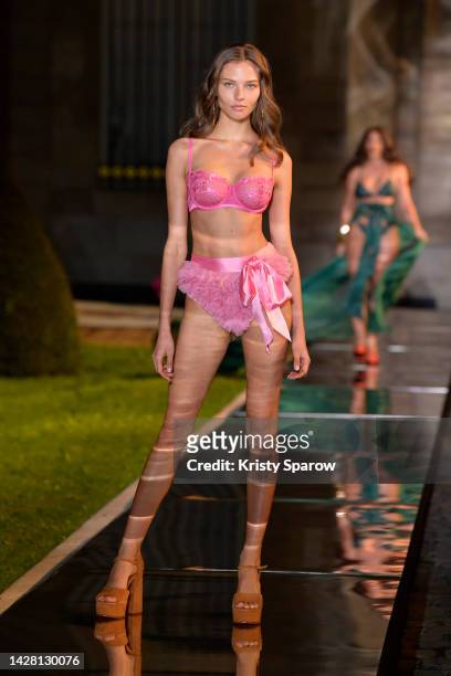 Model walks the runway during the Etam Womenswear Spring/Summer 2023 show as part of Paris Fashion Week on September 27, 2022 in Paris, France.