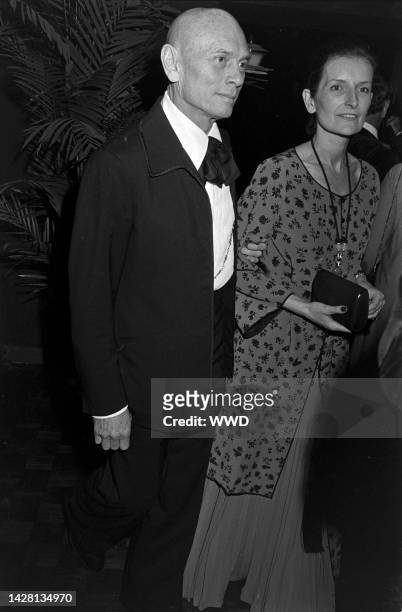 Yul Brynner and Jacqueline de Croisset attend a party at Tavern on the Green in New York City on March 28, 1977.