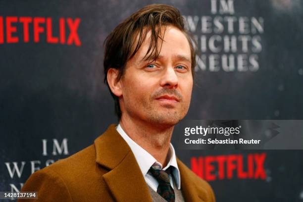 Tom Schilling attends the German premiere of The Netflix Film "All Quiet On The Western Front" at Kino International on September 27, 2022 in Berlin,...