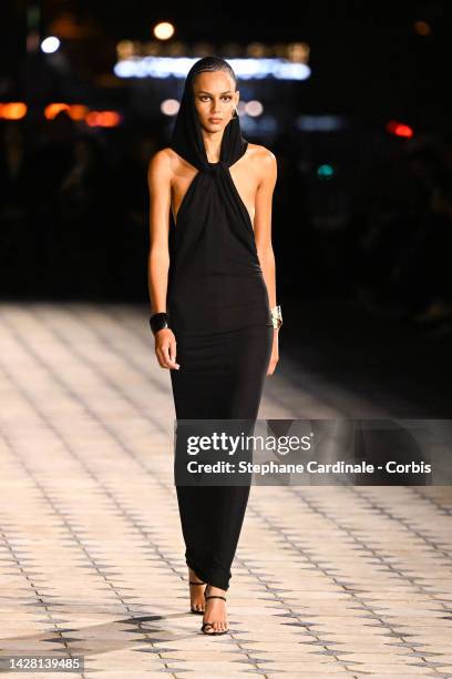 Binx Walton walks the runway during the Saint Laurent Womenswear Spring/Summer 2023 show as part of Paris Fashion Week on September 27, 2022 in...