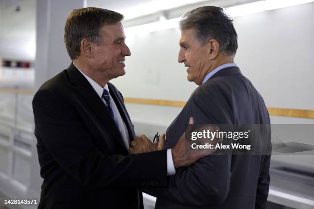 Sen. Joe Manchin shares a moment with Sen. Mark Warner prior to a cloture vote on Capitol Hill September 27, 2022 in Washington, DC. The Senate...